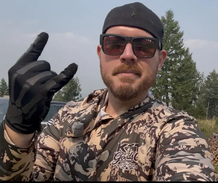 Cody Rhoads wearing KTT camouflage outdoors in Northwest Montana