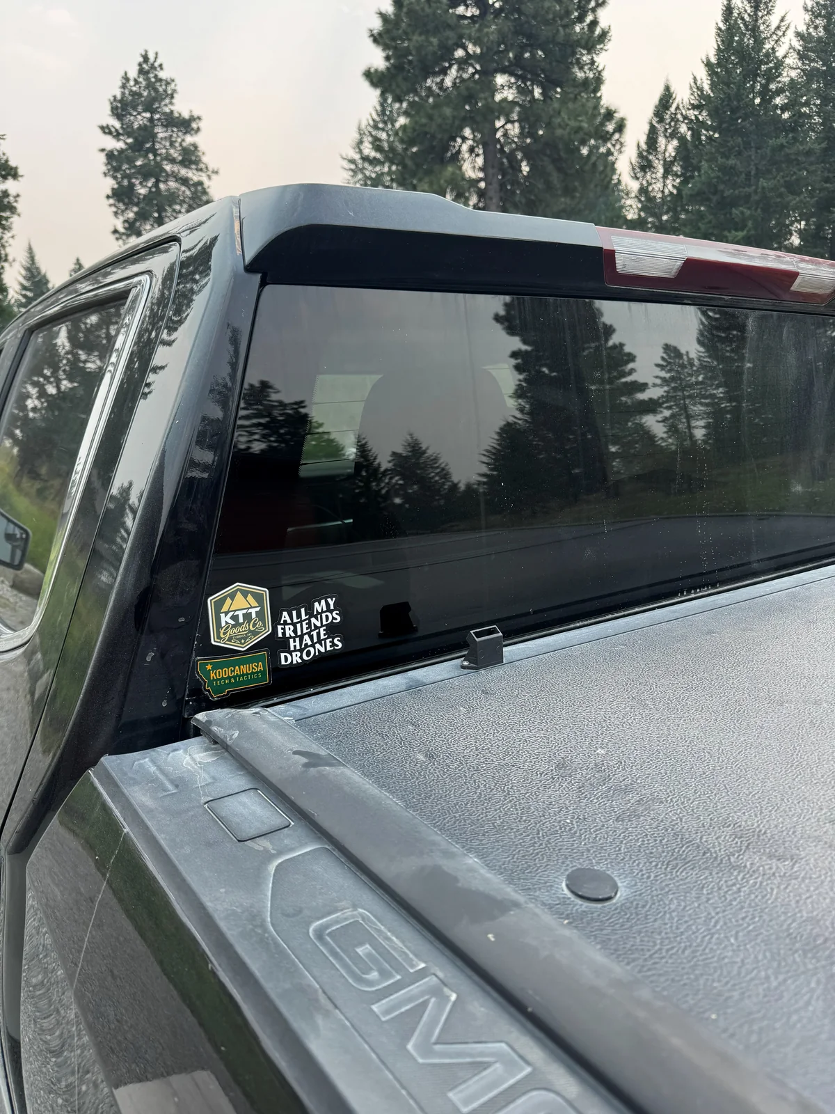 KTT Goods Co. and Koocanusa Tech and Tactics decals on a truck in Northwest Montana