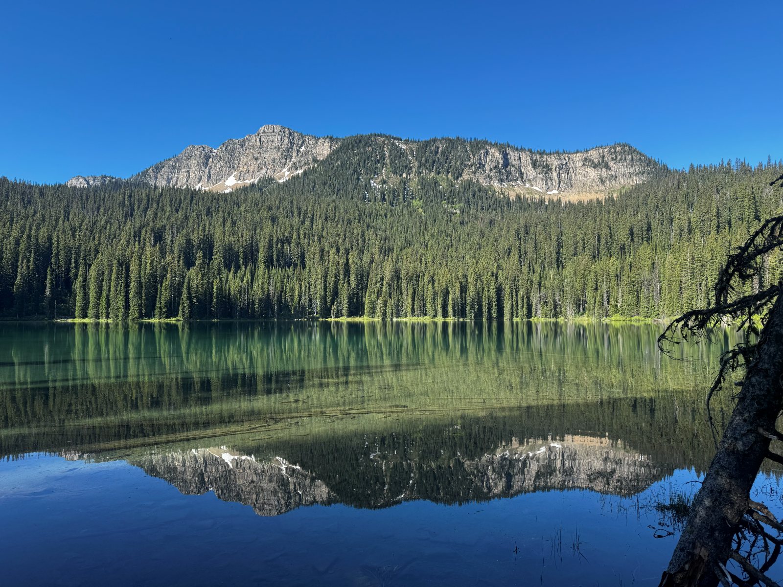 Clear mountain lake reflection in Northwest Montana