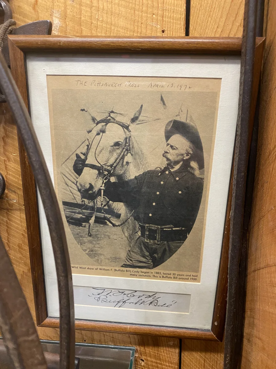 Framed western sketch in a museum display